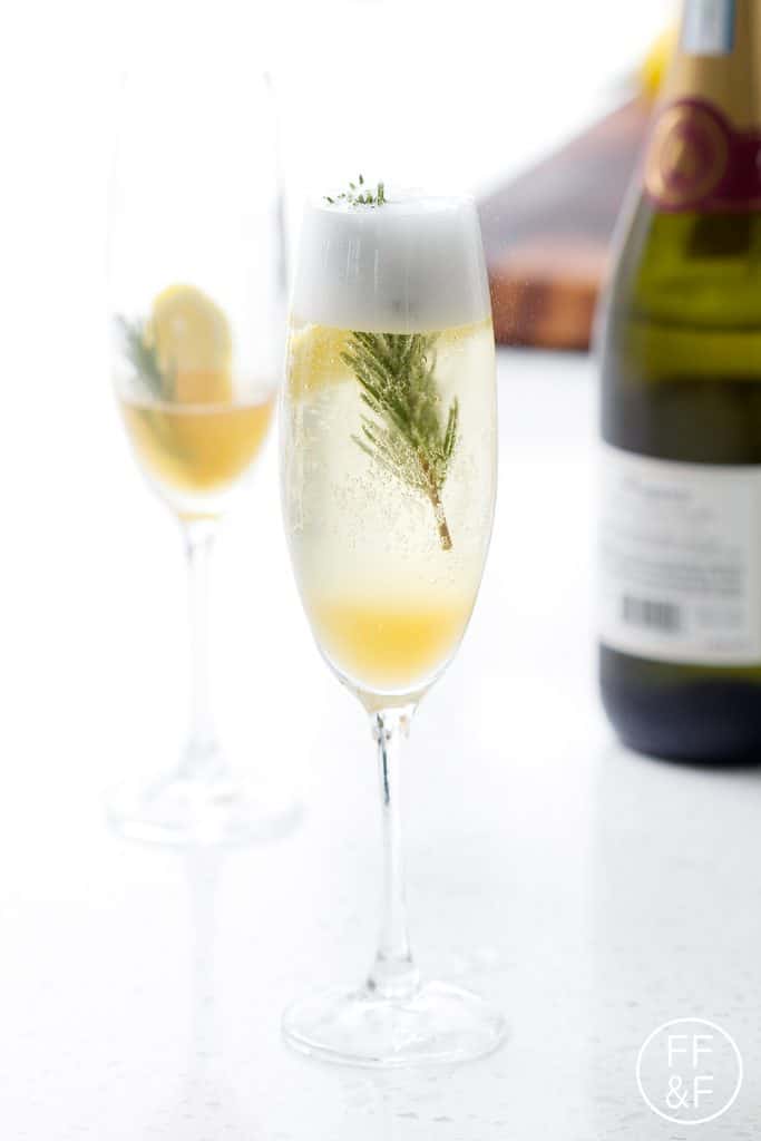 Sparkling Lemon Rosemary Cocktail with Four Roses Bourbon and Prosecco from Foodfashionandfun.com